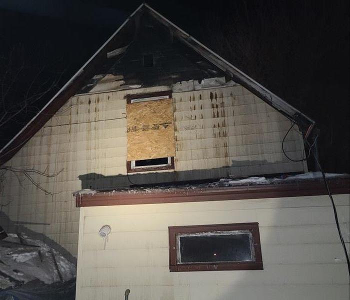 House boarded up after fire